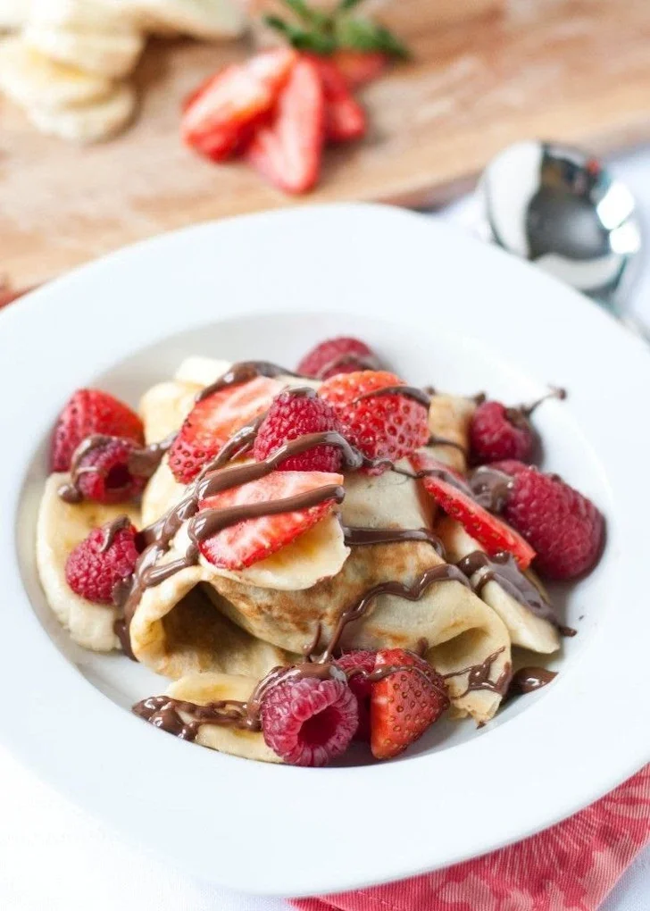 Belgian Crepe - Light and delicate Belgian-style crepe filled with your choice of sweet toppings — the best crepe spot in Kenner!