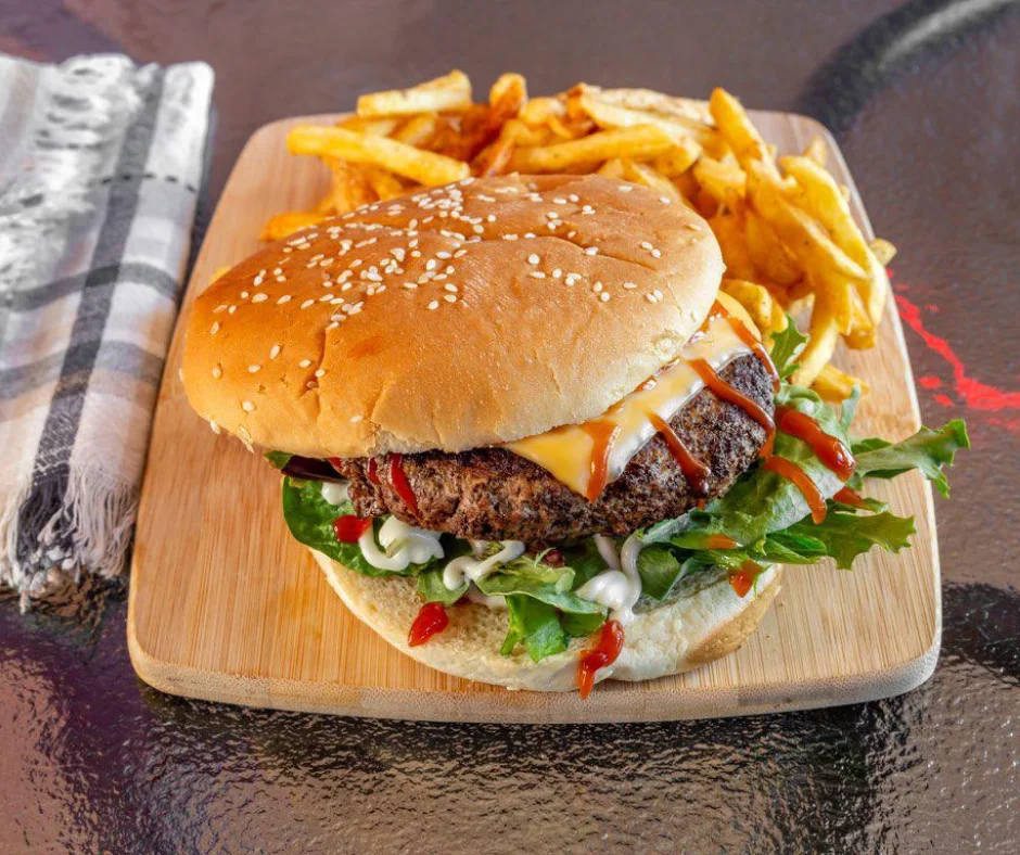 Kaif Burger - Our signature juicy burger loaded with fresh toppings and house sauce — the best burger in Kenner according to our loyal guests.